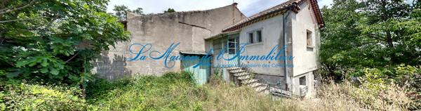 Saint AMBROIX, maison de type F5 mitoyenne à rénover avec terrain de 5517 m²