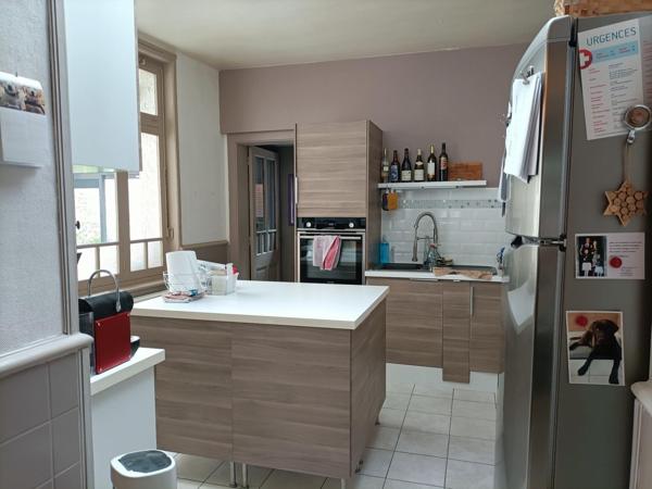 maison mitoyenne avec du potentiel et chaleureuse