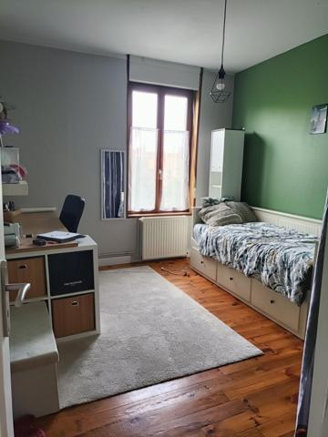 maison mitoyenne avec du potentiel et chaleureuse