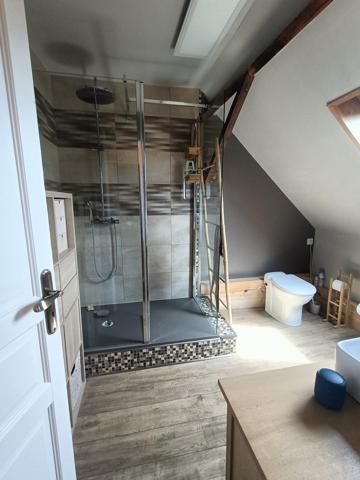 maison mitoyenne avec du potentiel et chaleureuse