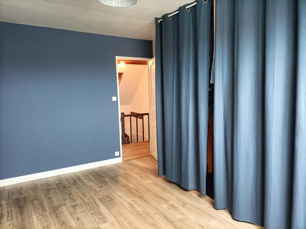 maison mitoyenne avec du potentiel et chaleureuse