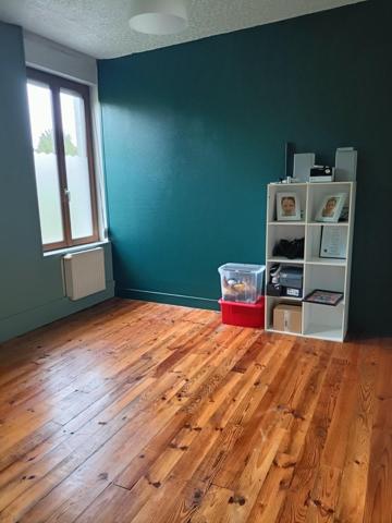 maison mitoyenne avec du potentiel et chaleureuse