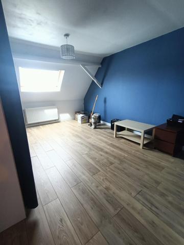maison mitoyenne avec du potentiel et chaleureuse