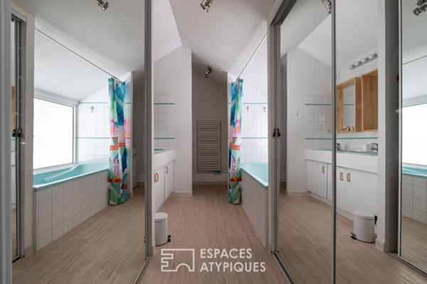 Appartement esprit loft en duplex avec vue sur le golf
