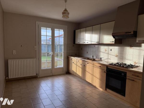 Maison traditionnelle sur sous-sol