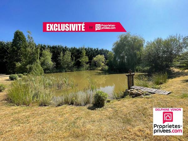 Propriété avec maison récente, plan d'eau et parc arboré de 6 619 m² à Sury Aux Bois