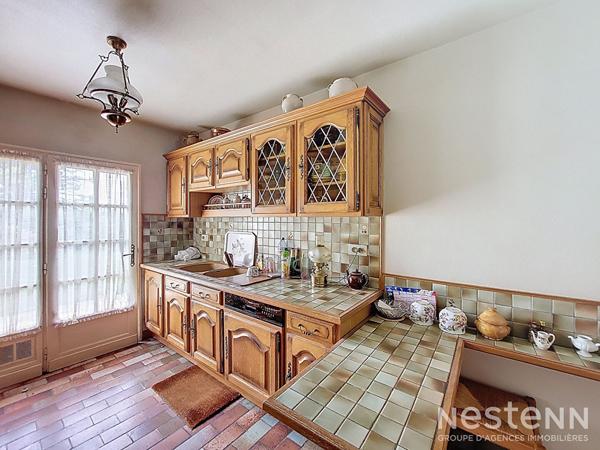 A Vendre Maison de 131 m² habitable de plain-pied avec garage et jardin dans un hameau