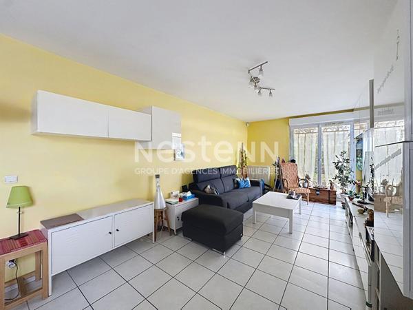 Appartement 3 pièces 2 chambres en rez de jardin avec cave - 69500 BRON