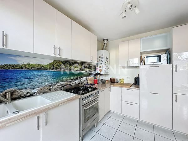 Appartement 3 pièces 2 chambres en rez de jardin avec cave - 69500 BRON