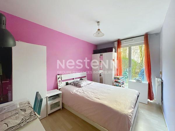 Appartement 3 pièces 2 chambres en rez de jardin avec cave - 69500 BRON