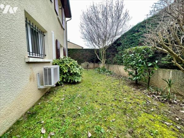 Maison familiale 4 chambres avec jardin arboré et grand garage