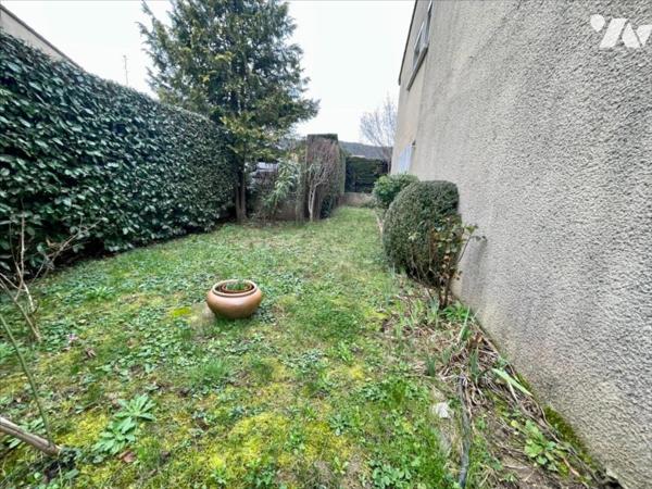 Maison familiale 4 chambres avec jardin arboré et grand garage