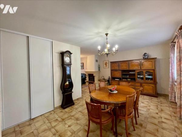 Maison familiale 4 chambres avec jardin arboré et grand garage