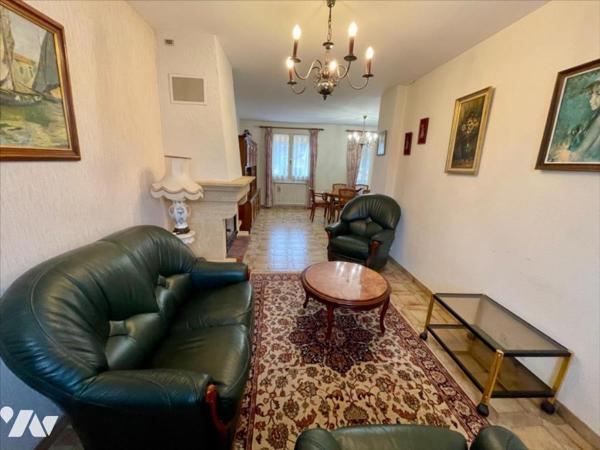 Maison familiale 4 chambres avec jardin arboré et grand garage