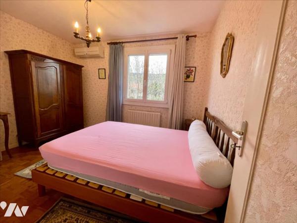 Maison familiale 4 chambres avec jardin arboré et grand garage