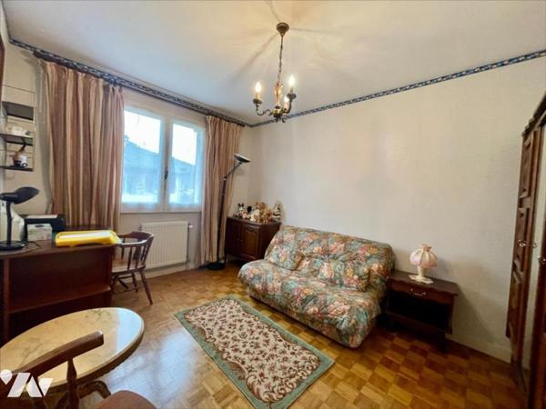 Maison familiale 4 chambres avec jardin arboré et grand garage