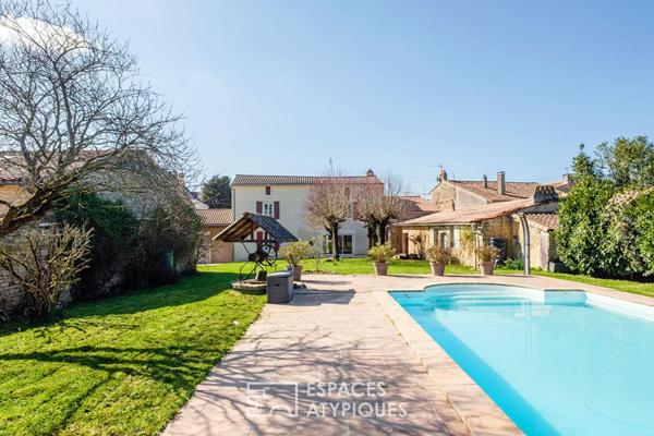 Charme de l’ancien revisité : maison familiale avec piscine et dépendances