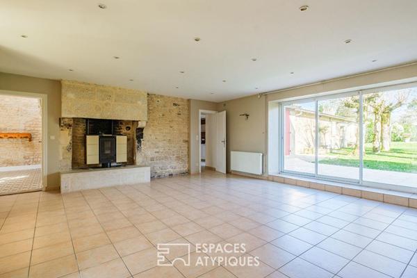 Charme de l’ancien revisité : maison familiale avec piscine et dépendances