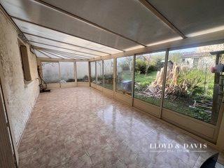 Maison avec dépendance et terrasse – beau potentiel après rénovation