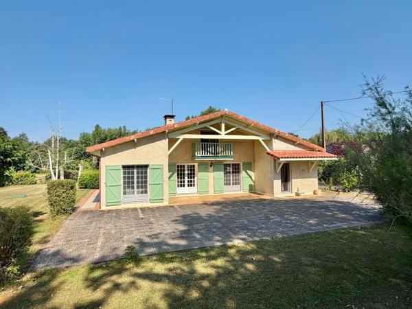 MAISON PLAIN PIED AVEC GRAND GARAGE  ET TERRAIN CLOS