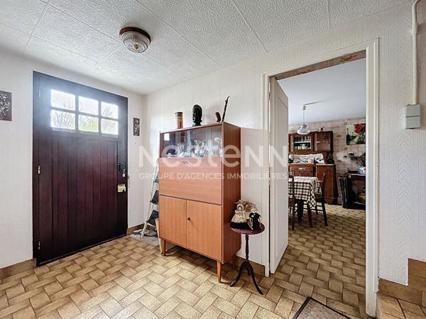 Maison à vendre à Brive dans le quartier du Prieur et à proximité de la plaine des jeux - 3 chambres - une salle de bains - une buanderie - un garage - une cave