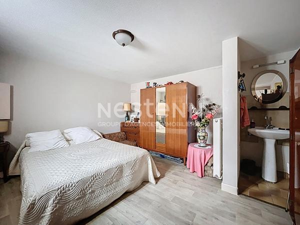 Maison à vendre à Brive dans le quartier du Prieur et à proximité de la plaine des jeux - 3 chambres - une salle de bains - une buanderie - un garage - une cave