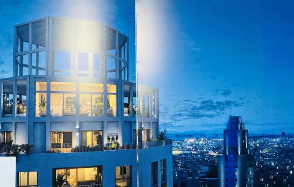 Surplombant un vaste îlot de verdure en plein coeur des gratte- ciel