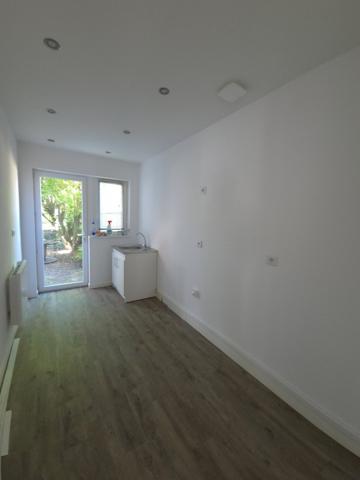 Ensemble immobilier de 128 m² avec jardin
