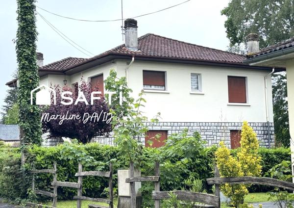 Maison 60's spacieuse avec grand garage et jardin