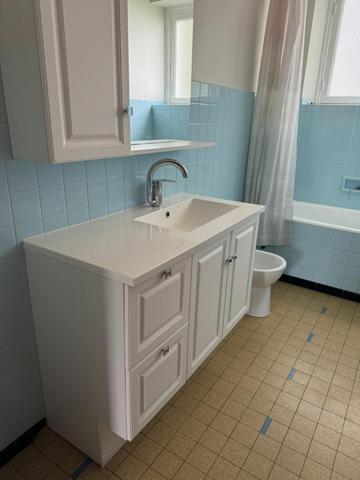 Maison 60's spacieuse avec grand garage et jardin