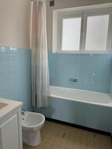 Maison 60's spacieuse avec grand garage et jardin