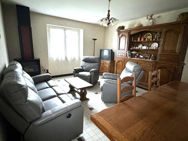 Maison 60's spacieuse avec grand garage et jardin