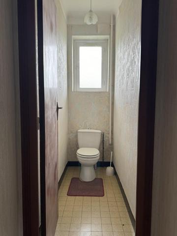 Maison 60's spacieuse avec grand garage et jardin