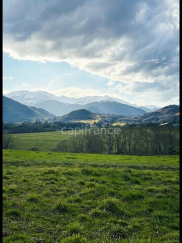 Terrain constructible de 3 278 m² – Vue imprenable sur les montagnes