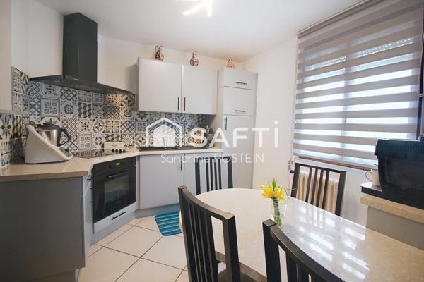 Maison jumelée 85m2 avec grand garage et jardin