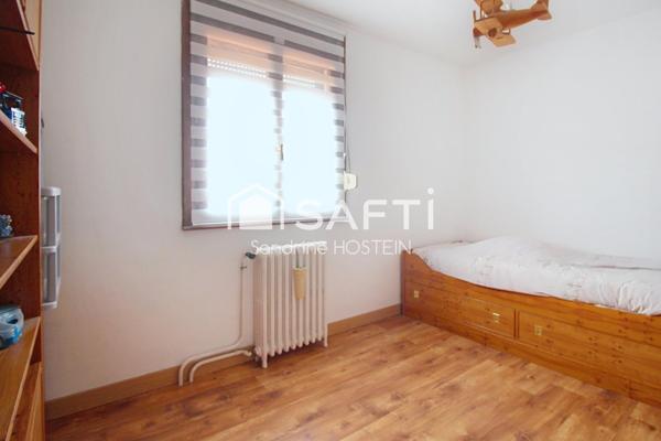 Maison jumelée 85m2 avec grand garage et jardin