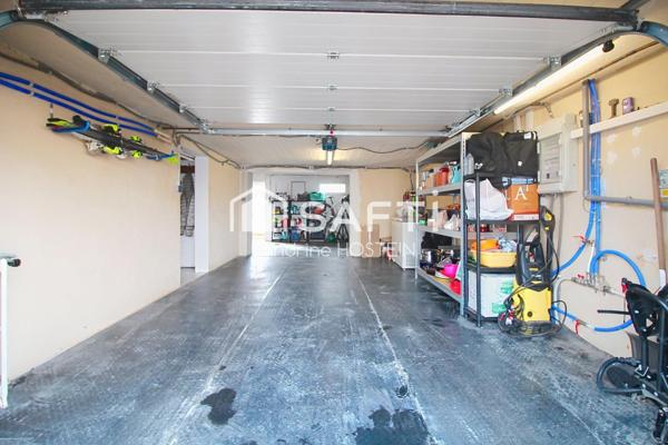 Maison jumelée 85m2 avec grand garage et jardin