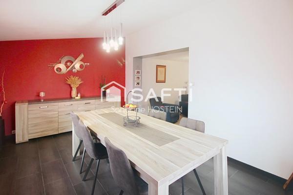 Maison jumelée 85m2 avec grand garage et jardin