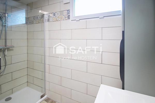 Maison jumelée 85m2 avec grand garage et jardin