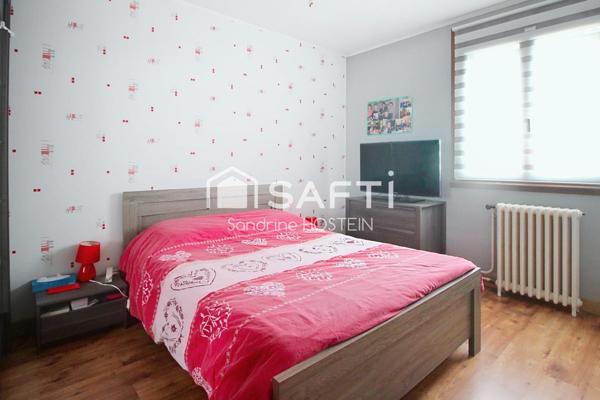 Maison jumelée 85m2 avec grand garage et jardin