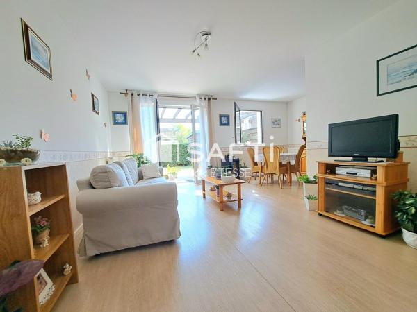 Le confort d'un appartement moderne et le plaisir d'une terrasse sur jardin !