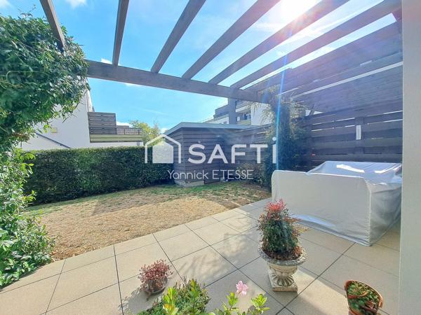 Le confort d'un appartement moderne et le plaisir d'une terrasse sur jardin !