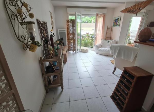 Appartement cosy lumineux avec balcon et 2 places de parkings