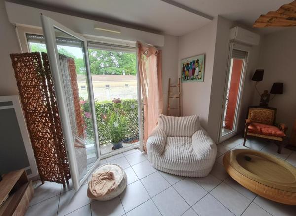 Appartement cosy lumineux avec balcon et 2 places de parkings