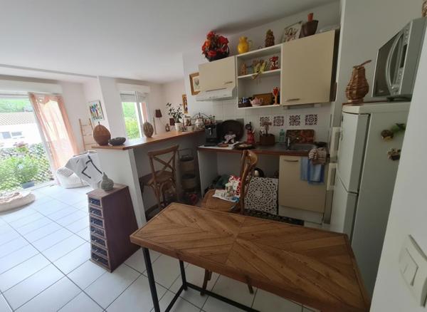 Appartement cosy lumineux avec balcon et 2 places de parkings