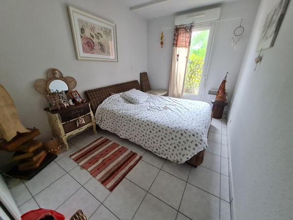 Appartement cosy lumineux avec balcon et 2 places de parkings