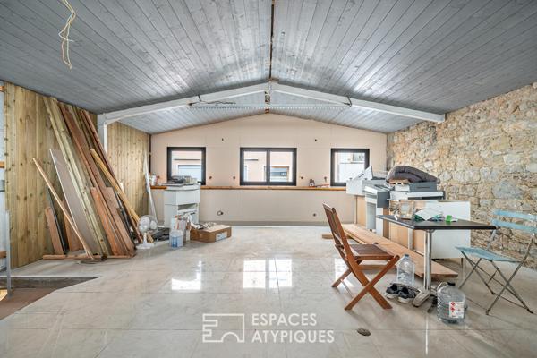 Duplex type maison de ville avec garage à réhabilter
