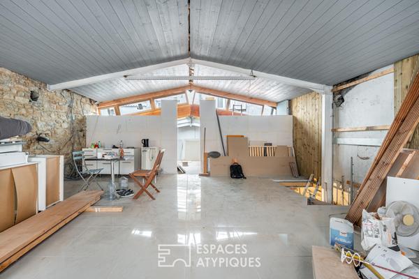 Duplex type maison de ville avec garage à réhabilter
