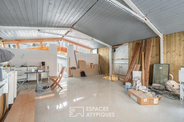 Duplex type maison de ville avec garage à réhabilter