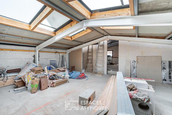 Duplex type maison de ville avec garage à réhabilter